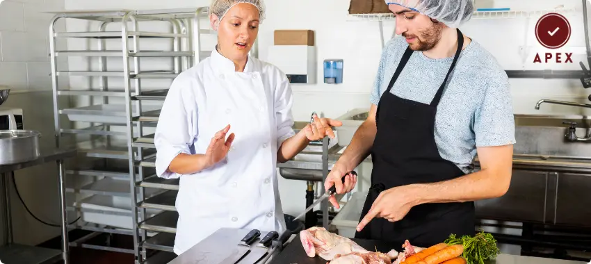 Certified HACCP professional inspecting hygiene compliance in a Kuwaiti food business